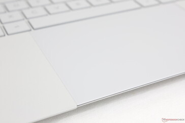 Note how the front of the clickpad touches the front edge of the base for a larger surface area unlike on most other laptop designs