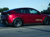 The Tesla Model Y robotaxi in Ultra Red color. (Image source: @AdanGuajardo/X)