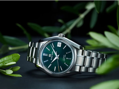 The new Grand Seiko SBGH375 pictured among leaves against a dark background. (Image source: @plus9time on Instagram - edited)