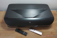 The large and heavy projector usually requires two remote controls to operate.