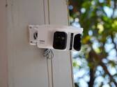 Baseus Security X1 Pro camera mounted on a wall.