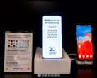New UDC demos from Visionox (center) and ZTE (right) emerge. (Source: Weibo)