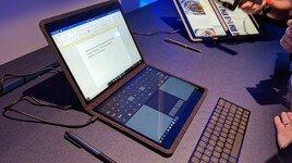 One of the displays can act as a keyboard, but Intel also supplies a thin tactile Bluetooth keyboard that can be stored between the two displays as a bookmark. (Source: The Verge)