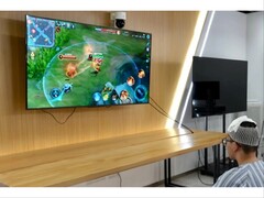 The 19-year-old patient using the Chinese BCI to play complex games. (Image source: IT Home)