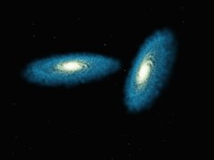 An artist's illustration showing two galaxies.