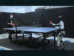 A Unitree G1 robot equipped with HITTER playing table tennis (Image source: Hybrid Robotics via YouTube; edited screenshot)