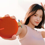 The Redmi Bluetooth Speaker 2 costs around $14 in China. Pictured: a promo image of the wireless speaker. (Image source: Xiaomi - edited)