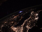 An image of Earth taken from the ISS, showing a thunderstorm in the distance. (Image source: Flickr/CC/ESA/NASA–T. Pesquet)