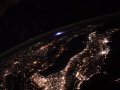 An image of Earth taken from the ISS, showing a thunderstorm in the distance. (Image source: Flickr/CC/ESA/NASA–T. Pesquet)