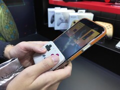 The new controller clips to the bottom of a phone, turning it into a Game Boy-style handheld. (Image source: @yoshivesmovie on X)