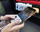 The new controller clips to the bottom of a phone, turning it into a Game Boy-style handheld. (Image source: @yoshivesmovie on X)