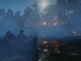 Red Dead Redemption 2 (PC) has support for HDR, high frame rates, and ultra-wide monitors. Pictured: A scene from the game, set in nighttime. (Image source: Steam)