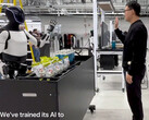 Optimus can now communicate with AI to hand objects (Image source: Tesla)