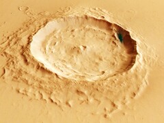 A bird's eye view of a martian crater near Eumenides Dorsum (Image source: ESA, DLR, and FU Berlin; cropped)