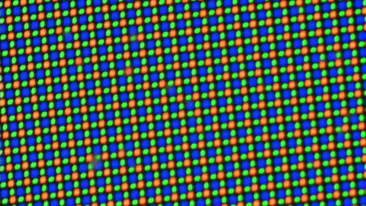The LG blue phosphorescent tandem OLED has the potential to shrink blue pixels while using less power to generate the same or better brightness vs current OLED panels (shown magnified). (Image source: Notebookcheck)