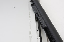Removable battery pack along the back of the system