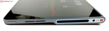 Left: power button, speaker, 3.5-mm headphone jack