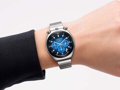 A Citizen Tsuno Chronograph with a blue gradient dial and stainless steel bracelet worn on a wrist against a white background.