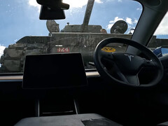 The Sherman tank climbing over a Tesla Model 3. (Image source: LBD/YT)