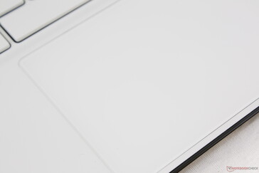 The white surface hides fingerprints better than the usual black clickpad on most other laptops