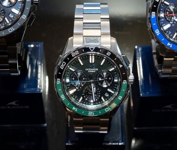 Casio Oceanus OCW-P3000 green watch shown from the front, featuring a green and black dial with a two-tone ceramic bezel.
