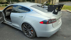 The Tesla was fitted with an old diesel engine to charge the battery (image: WarpedPerception/YT)