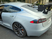 The Tesla was fitted with an old diesel engine to charge the battery (image: WarpedPerception/YT)