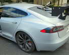 The Tesla was fitted with an old diesel engine to charge the battery (image: WarpedPerception/YT)