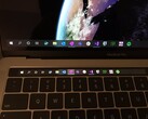 Slightly more useful? The hack puts the Windows 10 Taskbar on the TouchBar in Bootcamp, but at the cost of the function keys. (Source: Twitter @imbushuo)