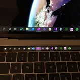 Slightly more useful? The hack puts the Windows 10 Taskbar on the TouchBar in Bootcamp, but at the cost of the function keys. (Source: Twitter @imbushuo)