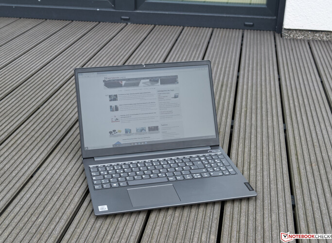 Using the ThinkBook 15 outdoors on a cloudy day.