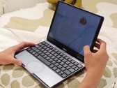 Torsin features a compact chassis with an unconventional round trackpad. (Image source: Torsin)