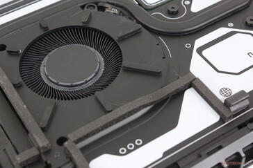 Cooling solution consists of twin ~60 mm fans, vapor chamber cooler, and a liquid metal thermal interface