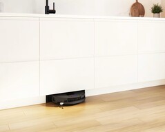 Bosch hides a vacuum and mopping robot in a kitchen.