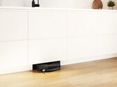 Bosch hides a vacuum and mopping robot in a kitchen.