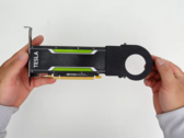 YouTuber holding the Nvidia Tesla P4 card in their hands