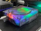 A picture of a modified SEGA Dreamcast with a translucent case in action