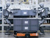 Two humanoid robots working on a factory floor (Image source: UBTech)