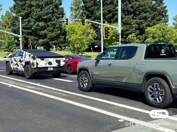 Shorter front and angular design make Tesla's Cybertruck look small next to the R1T