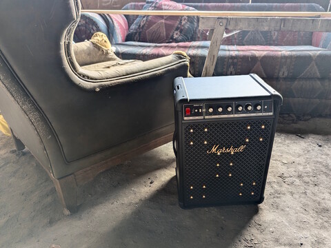Marshall Bromley 450 in an old barn with an armchair
