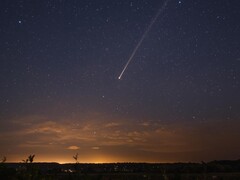 An image generated by Canva showing a meteorite in the sky.