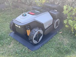 RockMow Z120 LiDAR in its charging station