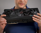 Alex Ziskind holding the RTX 5090 GPU.