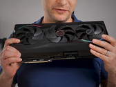 Alex Ziskind holding the RTX 5090 GPU.