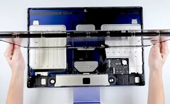 The mainboard of the Apple iMac is downright tiny compared to the size of the case. (Image: iFixit)