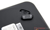 glued-on rubber feet cover the screws