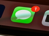 Apple's Messages app, icon pictured, adds a new toggle to hide the dictation button in the text field.