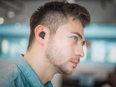 Finding the perfect wireless headphones for your routine can be a challenge. (Image Source: Unsplash/Edited)