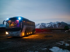 A bus parked in a snowy area (Image source: Juan Encalada via Unsplash; cropped)