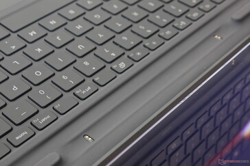 Magnetic recess above the first row of keyboard keys for charging and housing the active pen